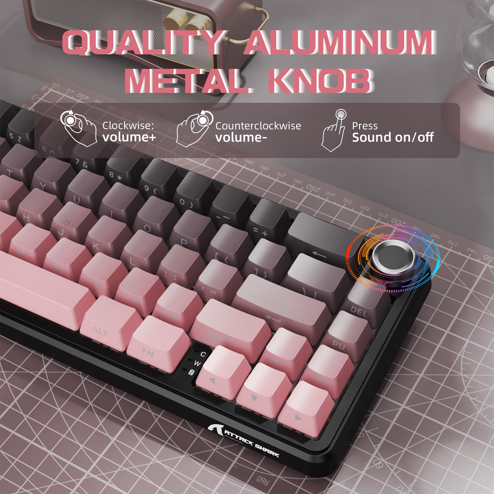 ATTACK SHARK X66 wireless mechanical keyboard with pink and gray keycaps, featuring a metal volume knob and RGB lighting.